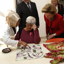 The Queen and the First Lady viewed samples of handicrafts made at Saray Care and Rehabilitation Centre. (Photo: Lise Åserud, NTB scanpix)